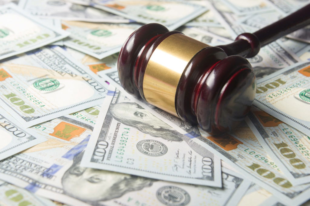 Judges Or Auctioneer Gavel On The Dollar Cash Background, Top View, Close-Up. Concept For Corruption, Bankruptcy, Bail, Crime, Bribing, Fraud, Auction Bidding, Fines Judges Or Auctioneer Gavel On The Dollar Cash Background, Top View, Close-Up. Concept For Corruption, Bankruptcy, Bail, Crime, Bribing, Fraud, Auction Bidding, Fines
