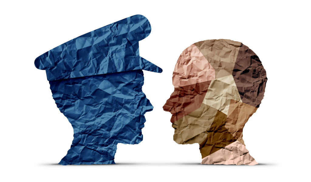 Police And Community Police and community building trust as law enforcement with policing and a diverse society as a policeman or policewoman symbol working with an icon of diversity in a 3D illustration style.