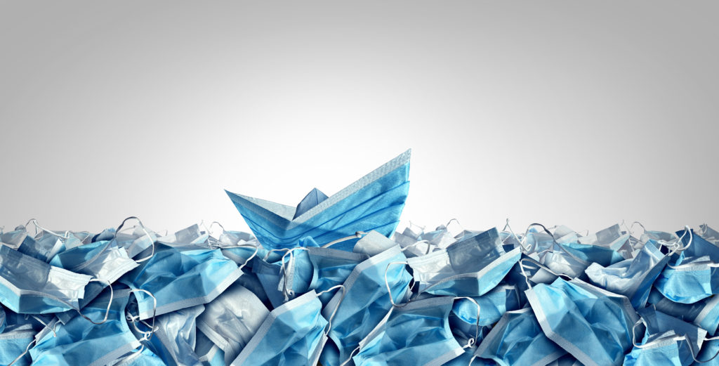 Health crisis strategy concept as covid-19 or coronavirus outbreak solution with a medical mask shaped as a boat sailing away as a symbol for navigating through prevention and healthcare worker protection issues.