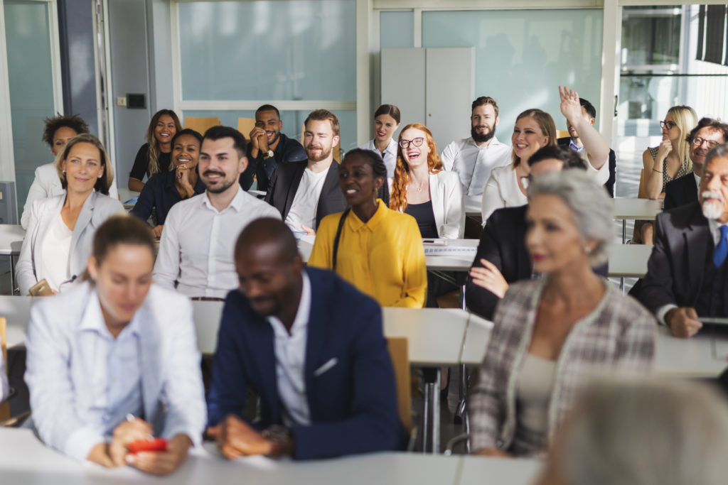 Cheerful business team attending a presentation