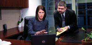 Sommers Schwartz attorneys discussing strategy